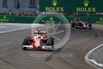 World © Octane Photographic Ltd. Scuderia Ferrari SF16-H – Sebastian Vettel and Scuderia Toro Rosso STR11 – Daniil Kvyat. Friday 16th September 2016, F1 Singapore GP Practice 1, Marina Bay Circuit, Singapore. Digital Ref :