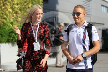 World © Octane Photographic Ltd. Williams Martini Racing – Valtteri Bottas and new wife Emilia Pikkarainen. Friday 16th September 2016, F1 Singapore GP Paddock, Marina Bay Circuit, Singapore. Digital Ref :1715CB1D5607