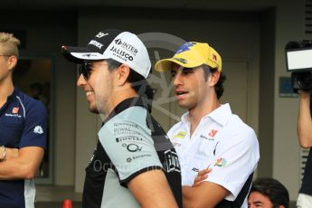 World © Octane Photographic Ltd. Sahara Force India VJM09 - Sergio Perez and Sauber F1 Team C35 – Felipe Nasr. Thursday 15th September 2016, F1 Singapore GP Paddock, Marina Bay Circuit, Singapore. Digital Ref :1713CB1D5528