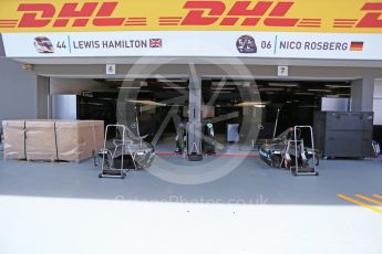 World © Octane Photographic Ltd. Mercedes AMG Petronas W07 Hybrid – Nico Rosberg and Lewis Hamilton cars under cover in garage. Thursday 15th September 2016, F1 Singapore GP Pitlane, Marina Bay Circuit, Singapore. Digital Ref : 1713LB2D8298