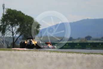 World © Octane Photographic Ltd. Renault Sport F1 Team RS16 - Kevin Magnussen and Red Bull. Saturday 14th May 2016, F1 Spanish GP Practice 3, Circuit de Barcelona Catalunya, Spain. Digital Ref : 1545CB1D9555