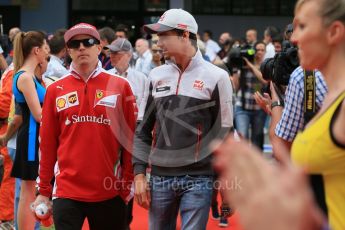 World © Octane Photographic Ltd. Scuderia Ferrari SF16-H – Kimi Raikkonen and Haas F1 Team VF-16 - Esteban Gutierrez. Sunday 15th May 2016, F1 Spanish GP Drivers’ Parade, Circuit de Barcelona Catalunya, Spain. Digital Ref :
