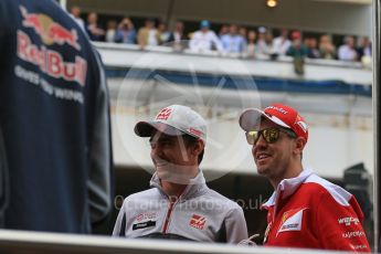 World © Octane Photographic Ltd. Haas F1 Team VF-16 - Esteban Gutierrez and Scuderia Ferrari SF16-H – Sebastian Vettel. Sunday 15th May 2016, F1 Spanish GP Drivers’ Parade, Circuit de Barcelona Catalunya, Spain. Digital Ref :