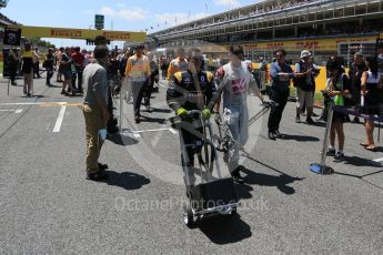 World © Octane Photographic Ltd. Renault and Haas mechanics setting up. Sunday 15th May 2016, F1 Spanish GP Grid, Circuit de Barcelona Catalunya, Spain. Digital Ref :