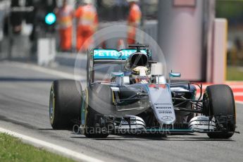 World © Octane Photographic Ltd. Mercedes AMG Petronas W07 Hybrid – Lewis Hamilton exits the pits. Sunday 15th May 2016, F1 Spanish GP Race, Circuit de Barcelona Catalunya, Spain. Digital Ref :