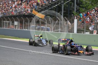 World © Octane Photographic Ltd. Scuderia Toro Rosso STR11 – Carlos Sainz and Sahara Force India VJM09 - Sergio Perez. Sunday 15th May 2016, F1 Spanish GP Race, Circuit de Barcelona Catalunya, Spain. Digital Ref :