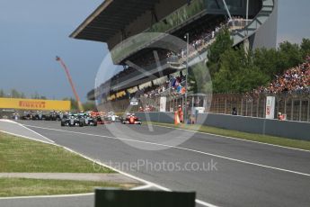 World © Octane Photographic Ltd. Mercedes AMG Petronas W07 Hybrid – Nico Rosberg and Lewis Hamilton lead the pack on the off the line. Sunday 15th May 2016, F1 Spanish GP Race, Circuit de Barcelona Catalunya, Spain. Digital Ref :