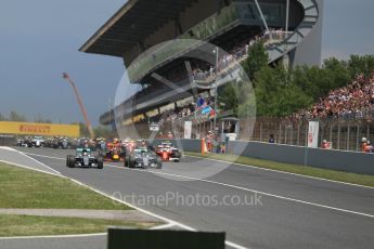 World © Octane Photographic Ltd. Mercedes AMG Petronas W07 Hybrid – Nico Rosberg and Lewis Hamilton lead the pack on the off the line. Sunday 15th May 2016, F1 Spanish GP Race, Circuit de Barcelona Catalunya, Spain. Digital Ref :