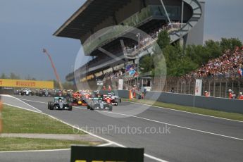 World © Octane Photographic Ltd. Mercedes AMG Petronas W07 Hybrid – Nico Rosberg and Lewis Hamilton lead the pack on the off the line. Sunday 15th May 2016, F1 Spanish GP Race, Circuit de Barcelona Catalunya, Spain. Digital Ref :