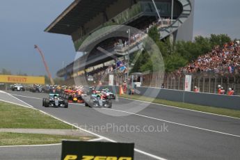 World © Octane Photographic Ltd. Mercedes AMG Petronas W07 Hybrid – Nico Rosberg and Lewis Hamilton lead the pack on the off the line. Sunday 15th May 2016, F1 Spanish GP Race, Circuit de Barcelona Catalunya, Spain. Digital Ref :