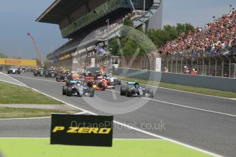 World © Octane Photographic Ltd. Mercedes AMG Petronas W07 Hybrid – Nico Rosberg and Lewis Hamilton lead the pack on the off the line. Sunday 15th May 2016, F1 Spanish GP Race, Circuit de Barcelona Catalunya, Spain. Digital Ref :