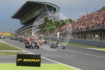 World © Octane Photographic Ltd. Mercedes AMG Petronas W07 Hybrid – Nico Rosberg and Lewis Hamilton lead the pack on the off the line. Sunday 15th May 2016, F1 Spanish GP Race, Circuit de Barcelona Catalunya, Spain. Digital Ref :