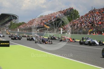 World © Octane Photographic Ltd. The pack heads away from the start. Sunday 15th May 2016, F1 Spanish GP Race, Circuit de Barcelona Catalunya, Spain. Digital Ref :