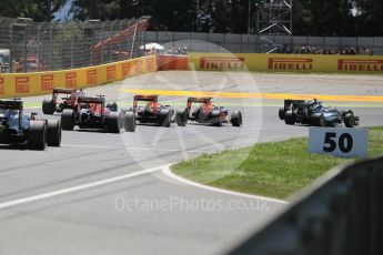 World © Octane Photographic Ltd. Mercedes AMG Petronas W07 Hybrid – Nico Rosberg and Lewis Hamilton lead the 2 Red Bulls into turn 1. Sunday 15th May 2016, F1 Spanish GP Race, Circuit de Barcelona Catalunya, Spain. Digital Ref :