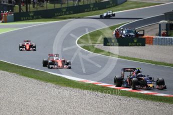 World © Octane Photographic Ltd. Scuderia Toro Rosso STR11 – Carlos Sainz leads the 2 Ferraris. Sunday 15th May 2016, F1 Spanish GP Race, Circuit de Barcelona Catalunya, Spain. Digital Ref :