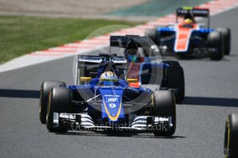 World © Octane Photographic Ltd. Sauber F1 Team C35 – Marcus Ericsson ahead of the 2 Manors. Sunday 15th May 2016, F1 Spanish GP Race, Circuit de Barcelona Catalunya, Spain. Digital Ref :