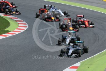 World © Octane Photographic Ltd. Mercedes AMG Petronas W07 Hybrid – Nico Rosberg and Lewis Hamilton lead into the 1st corner. Sunday 15th May 2016, F1 Spanish GP Race, Circuit de Barcelona Catalunya, Spain. Digital Ref :