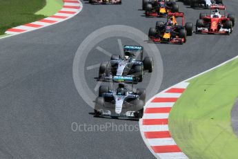 World © Octane Photographic Ltd. Mercedes AMG Petronas W07 Hybrid – Nico Rosberg and Lewis Hamilton lead into the 1st corner. Sunday 15th May 2016, F1 Spanish GP Race, Circuit de Barcelona Catalunya, Spain. Digital Ref :