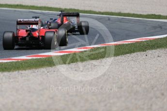 World © Octane Photographic Ltd. Scuderia Toro Rosso STR11 – Carlos Sainz and Scuderia Ferrari SF16-H – Kimi Raikkonen. Sunday 15th May 2016, F1 Spanish GP Race, Circuit de Barcelona Catalunya, Spain. Digital Ref :