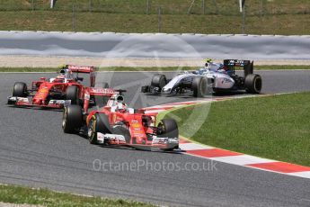 World © Octane Photographic Ltd. Scuderia Ferrari SF16-H – Sebastian Vettel and Kimi Raikkonen and Williams Martini Racing, Williams Mercedes FW38 – Valtteri Bottas. Sunday 15th May 2016, F1 Spanish GP Race, Circuit de Barcelona Catalunya, Spain. Digital Ref :