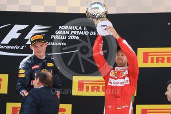 World © Octane Photographic Ltd. Red Bull Racing RB12 – Max Verstappen (1st) and Scuderia Ferrari - Sebastian Vettel (3rd). Sunday 15th May 2016, F1 Spanish GP Podium, Circuit de Barcelona Catalunya, Spain. Digital Ref :