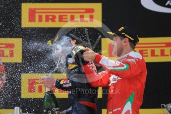 World © Octane Photographic Ltd. Red Bull Racing RB12 – Max Verstappen (1st) and Scuderia Ferrari - Sebastian Vettel (3rd). Sunday 15th May 2016, F1 Spanish GP Podium, Circuit de Barcelona Catalunya, Spain. Digital Ref :