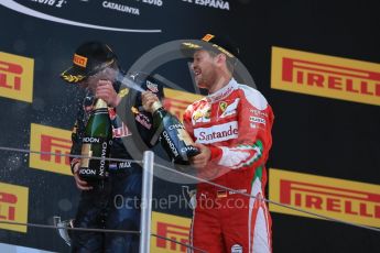 World © Octane Photographic Ltd. Red Bull Racing RB12 – Max Verstappen (1st) and Scuderia Ferrari - Sebastian Vettel (3rd). Sunday 15th May 2016, F1 Spanish GP Podium, Circuit de Barcelona Catalunya, Spain. Digital Ref :