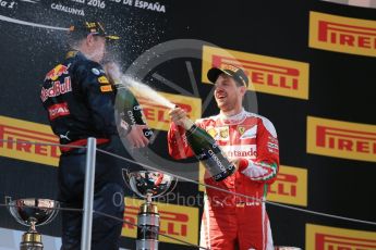 World © Octane Photographic Ltd. Red Bull Racing RB12 – Max Verstappen (1st) and Scuderia Ferrari - Sebastian Vettel (3rd). Sunday 15th May 2016, F1 Spanish GP Podium, Circuit de Barcelona Catalunya, Spain. Digital Ref :