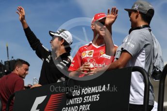 World © Octane Photographic Ltd. Sahara Force India VJM09 - Sergio Perez and Scuderia Ferrari SF16-H – Sebastian Vettel. Sunday 23rd October 2016, F1 USA Grand Prix Drivers’ Parade, Austin, Texas – Circuit of the Americas (COTA). Digital Ref :1748LB1D3367