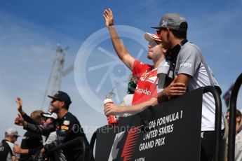 World © Octane Photographic Ltd. Scuderia Ferrari SF16-H – Sebastian Vettel and Manor Racing MRT05 - Pascal Wehrlein. Sunday 23rd October 2016, F1 USA Grand Prix Drivers’ Parade, Austin, Texas – Circuit of the Americas (COTA). Digital Ref :1748LB1D3429