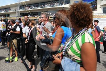 World © Octane Photographic Ltd. Gordon Ramsey and Venus Williams. Sunday 23rd October 2016, F1 USA Grand Prix Grid, Austin, Texas – Circuit of the Americas (COTA). Digital Ref :1748LB2D5947