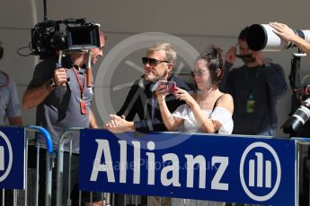 World © Octane Photographic Ltd. Christoph Waltz and Rosa Salazar in Parc Ferme. Saturday 22nd October 2016, F1 USA Grand Prix Qualifying, Austin, Texas – Circuit of the Americas (COTA). Digital Ref :1747LB1D3037