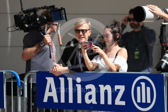 World © Octane Photographic Ltd. Christoph Waltz and Rosa Salazar in Parc Ferme. Saturday 22nd October 2016, F1 USA Grand Prix Qualifying, Austin, Texas – Circuit of the Americas (COTA). Digital Ref :1747LB1D3039