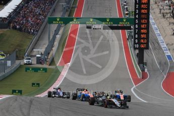 World © Octane Photographic Ltd. Sahara Force India VJM09 - Sergio Perez ahead of Manor Racing MRT05 - Pascal Wehrlein and Esteban Ocon. Sunday 23rd October 2016, F1 USA Grand Prix Race, Austin, Texas – Circuit of the Americas (COTA). Digital Ref :1749LB1D3678