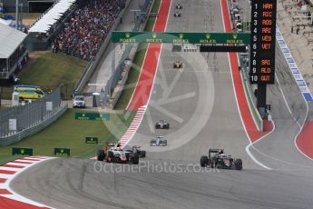 World © Octane Photographic Ltd. McLaren Honda MP4-31 – Jenson Button and Haas F1 Team VF-16 - Esteban Gutierrez. Sunday 23rd October 2016, F1 USA Grand Prix Race, Austin, Texas – Circuit of the Americas (COTA). Digital Ref :1749LB1D3714