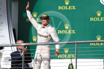World © Octane Photographic Ltd. Mercedes AMG Petronas W07 Hybrid – Nico Rosberg (2nd). Sunday 23rd October 2016, F1 USA Grand Prix Podium, Austin, Texas – Circuit of the Americas (COTA). Digital Ref : 1750LB1D4195