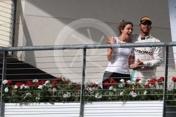World © Octane Photographic Ltd. Mercedes AMG Petronas – Lewis Hamilton (1st) with Victoria Vowels - Mercedes Partner Services Director. Sunday 23rd October 2016, F1 USA Grand Prix Podium, Austin, Texas – Circuit of the Americas (COTA). Digital Ref :1750LB1D4211