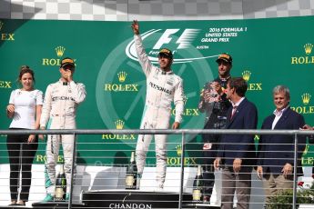 World © Octane Photographic Ltd. Mercedes AMG Petronas – Lewis Hamilton (1st) and Nico Rosberg (2nd) and Red Bull Racing – Daniel Ricciardo (3rd) with Victoria Vowels - Mercedes Partner Services Director. Sunday 23rd October 2016, F1 USA Grand Prix Podium, Austin, Texas – Circuit of the Americas (COTA). Digital Ref :1750LB1D4247