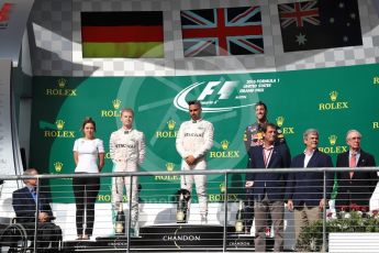 World © Octane Photographic Ltd. Mercedes AMG Petronas – Lewis Hamilton (1st) and Nico Rosberg (2nd) and Red Bull Racing – Daniel Ricciardo (3rd) with Victoria Vowels - Mercedes Partner Services Director. Sunday 23rd October 2016, F1 USA Grand Prix Podium, Austin, Texas – Circuit of the Americas (COTA). Digital Ref :1750LB1D4261