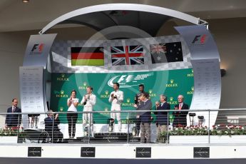 World © Octane Photographic Ltd. Mercedes AMG Petronas – Lewis Hamilton (1st) and Nico Rosberg (2nd) and Red Bull Racing – Daniel Ricciardo (3rd) with Victoria Vowels - Mercedes Partner Services Director. Sunday 23rd October 2016, F1 USA Grand Prix Podium, Austin, Texas – Circuit of the Americas (COTA). Digital Ref :1750LB1D4285