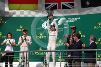World © Octane Photographic Ltd. Mercedes AMG Petronas – Lewis Hamilton (1st) and Nico Rosberg (2nd) and Red Bull Racing – Daniel Ricciardo (3rd) with Victoria Vowels - Mercedes Partner Services Director. Sunday 23rd October 2016, F1 USA Grand Prix Podium, Austin, Texas – Circuit of the Americas (COTA). Digital Ref :1750LB1D4343