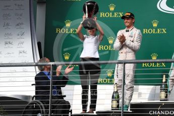 World © Octane Photographic Ltd. Mercedes AMG Petronas – Nico Rosberg (2nd) with Victoria Vowels - Mercedes Partner Services Director. Sunday 23rd October 2016, F1 USA Grand Prix Podium, Austin, Texas – Circuit of the Americas (COTA). Digital Ref :1750LB1D4364