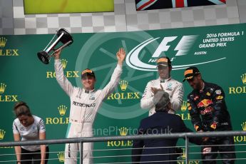 World © Octane Photographic Ltd. Mercedes AMG Petronas – Lewis Hamilton (1st) and Nico Rosberg (2nd) and Red Bull Racing – Daniel Ricciardo (3rd) with Victoria Vowels - Mercedes Partner Services Director. Sunday 23rd October 2016, F1 USA Grand Prix Podium, Austin, Texas – Circuit of the Americas (COTA). Digital Ref :1750LB1D4379
