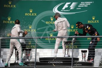 World © Octane Photographic Ltd. Mercedes AMG Petronas – Lewis Hamilton (1st) and Nico Rosberg (2nd) and Red Bull Racing – Daniel Ricciardo (3rd). Sunday 23rd October 2016, F1 USA Grand Prix Podium, Austin, Texas – Circuit of the Americas (COTA). Digital Ref :1750LB1D4430
