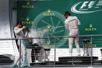 World © Octane Photographic Ltd. Mercedes AMG Petronas – Lewis Hamilton (1st) and Nico Rosberg (2nd) with Victoria Vowels - Mercedes Partner Services Director. Sunday 23rd October 2016, F1 USA Grand Prix Podium, Austin, Texas – Circuit of the Americas (COTA). Digital Ref :1750LB1D4437
