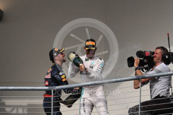 World © Octane Photographic Ltd. Mercedes AMG Petronas – Lewis Hamilton (1st) and Red Bull Racing – Daniel Ricciardo (3rd). Sunday 23rd October 2016, F1 USA Grand Prix Podium, Austin, Texas – Circuit of the Americas (COTA). Digital Ref :1750LB1D4451