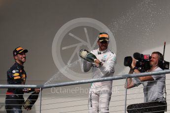 World © Octane Photographic Ltd. Mercedes AMG Petronas – Lewis Hamilton (1st) and Red Bull Racing – Daniel Ricciardo (3rd). Sunday 23rd October 2016, F1 USA Grand Prix Podium, Austin, Texas – Circuit of the Americas (COTA). Digital Ref :1750LB1D4460