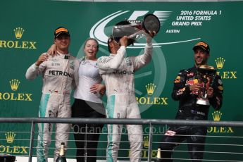 World © Octane Photographic Ltd. Mercedes AMG Petronas – Lewis Hamilton (1st) and Nico Rosberg (2nd) and Red Bull Racing – Daniel Ricciardo (3rd) with Victoria Vowels - Mercedes Partner Services Director. Sunday 23rd October 2016, F1 USA Grand Prix Podium, Austin, Texas – Circuit of the Americas (COTA). Digital Ref :1750LB1D4561