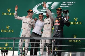World © Octane Photographic Ltd. Mercedes AMG Petronas – Lewis Hamilton (1st) and Nico Rosberg (2nd) and Red Bull Racing – Daniel Ricciardo (3rd) with Victoria Vowels - Mercedes Partner Services Director. Sunday 23rd October 2016, F1 USA Grand Prix Podium, Austin, Texas – Circuit of the Americas (COTA). Digital Ref :1750LB1D4596