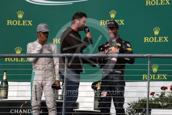 World © Octane Photographic Ltd. Gerard Butler with Mercedes AMG Petronas – Lewis Hamilton (1st) and Red Bull Racing – Daniel Ricciardo (3rd). Sunday 23rd October 2016, F1 USA Grand Prix Podium, Austin, Texas – Circuit of the Americas (COTA). Digital Ref :1750LB1D4640